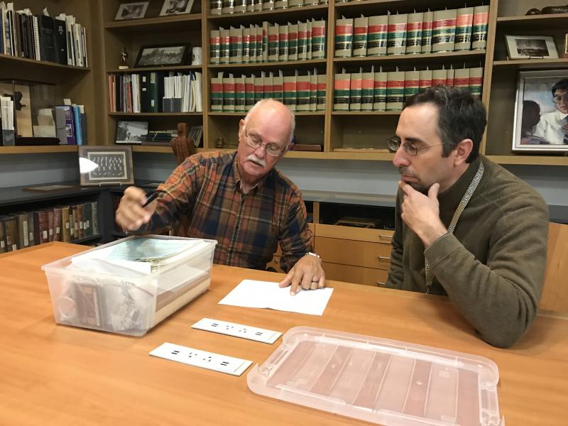 Denny Carroll Presenting HTG Material to Craig Simpson, Director MLK Library Arc